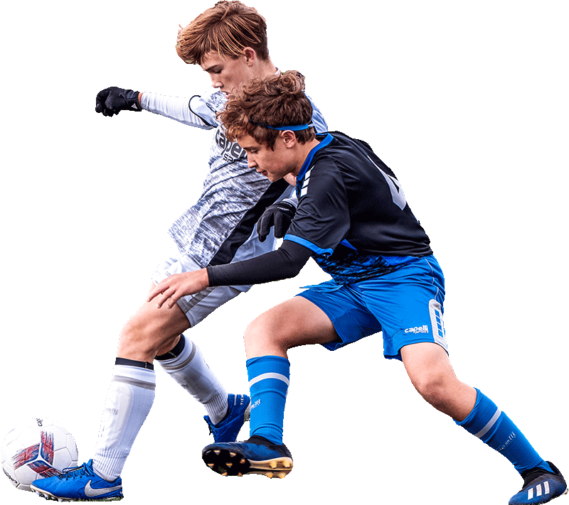 boy players battling for ball
