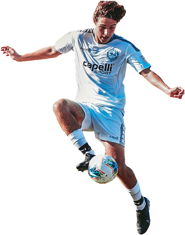 senior boy volleying ball