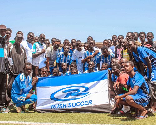 African players holding rush flag